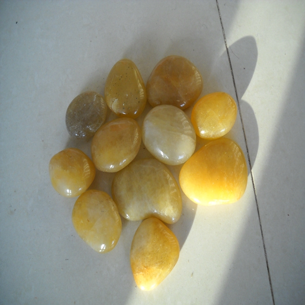 Yellow polished pebbles